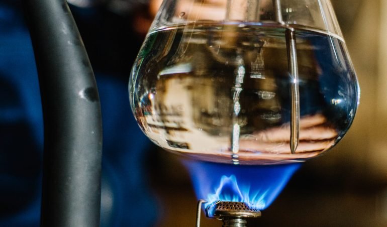 Siphon vacuum coffee maker on cafe bar